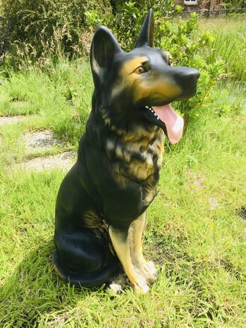 herders  hond zittend polyester beeld 